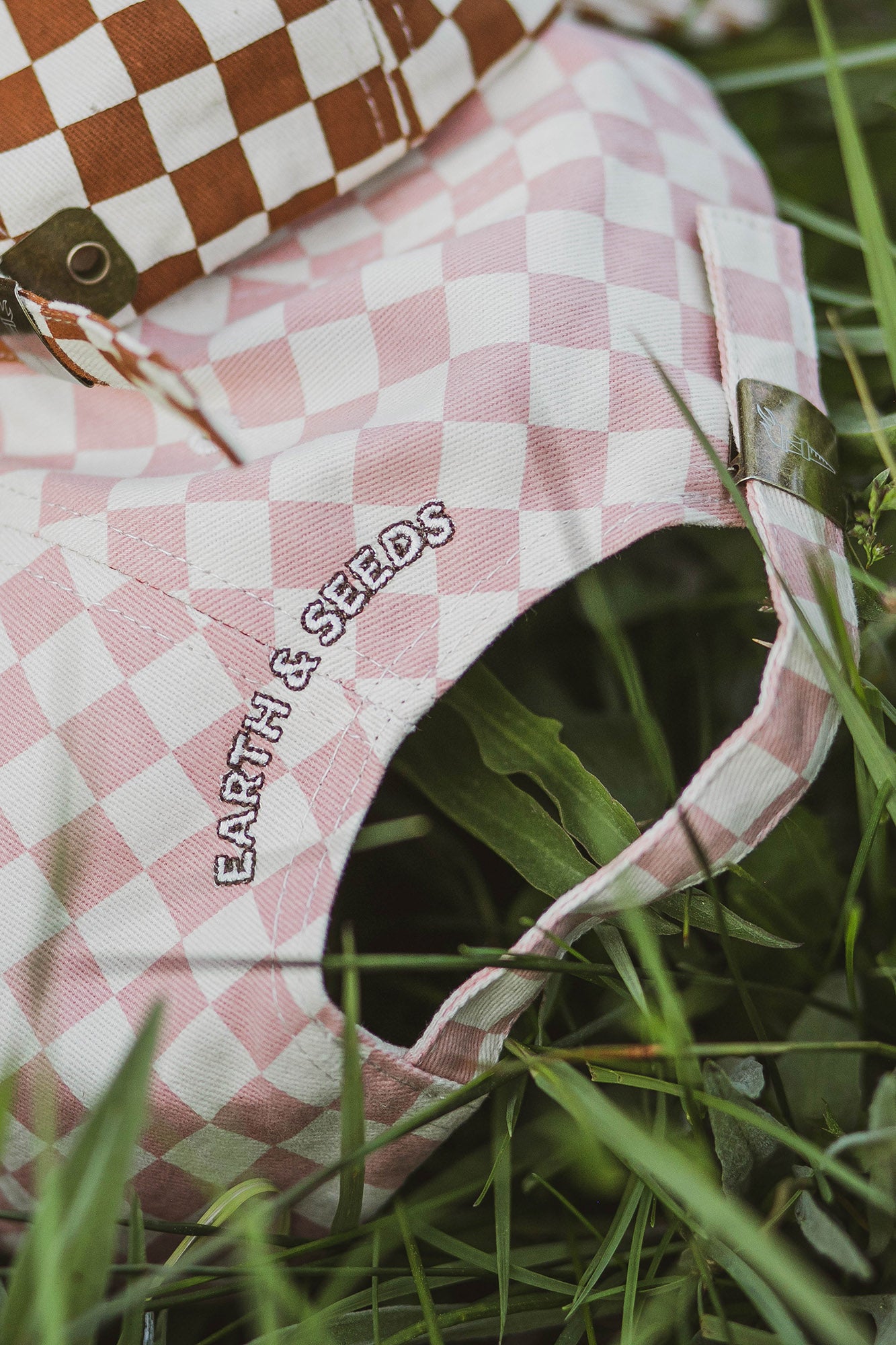 Growing in the Sierra hat, brown checkerboard